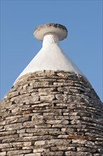Conical roof and pinnacle of a Trullo house