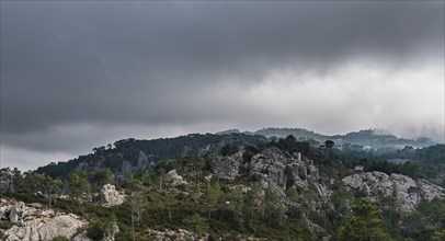 Mountain landscape with dramatic clouds