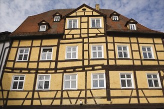 Yellow half-timbered building in the medieval town