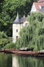Holderlin Tower and punts on the Neckar river