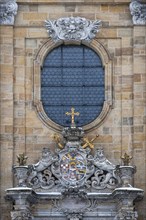 Coat of arms of Friedrich Carl von Schonborn above the entrance of the Gossweinstein pilgrimage church of the Holy Trinity