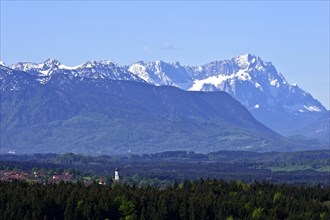 View from Peretshofener Hohe of Konigsdorf and the pre Alps to Zugspitze