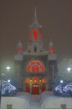 Illuminated church Paroisse Saint-Sauveur in winter