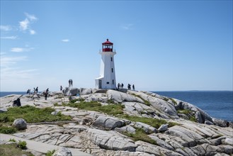 Lighthouse on granite rocks in Peggys Cove