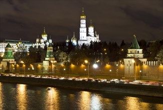 Moscow Kremlin with cathedrals on Moskva River at night