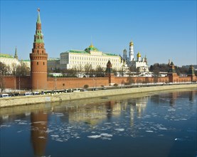 Moscow Kremlin with palace and cathedrals on bank of Moskva River in spring