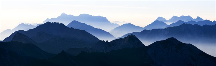 Peaks of the Allgau Alps in steplike arrangement in the early morning