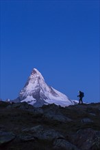 The Matterhorn with a hiker
