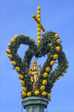 Saint figure with Easter decorations