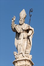Baroque statue on top of the column of Saint Oronzo