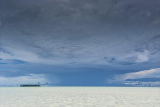 Dramatic sky above an islet
