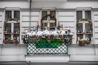 Christmas kitsch and knickknacks at a window