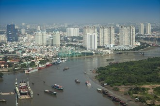 Aerial view of Saigon River with the city center