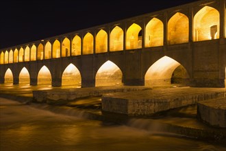 Illuminated Si-o-se Pol Bridge or Allah-Verdi Khan Bridge at night