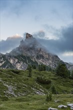 Mount Sass de Stria in the clouds at sunrise