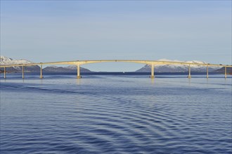 Sortland Bridge over wavy blue waters of Sortlandssundet strait