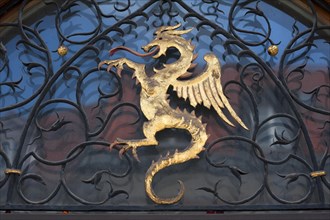 Dragon figure over the entrance of the town hall