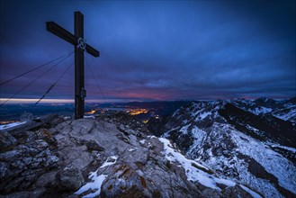 Summit cross of Mt Aggenstein at dusk