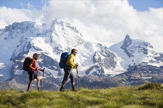 A man and a woman hiking