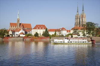 Cathedral Island Ostrow Tumski with tourist boat on the River Oder
