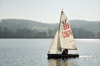 Sailing boat on Baldeneysee Lake or Lake Baldeney