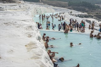 Bathers on the travertine terraces of Pamukkale