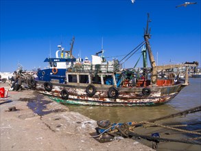 Very old fishing boat in the port of Essaouira