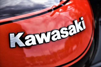 Fuel tank with the inscription Kawasaki