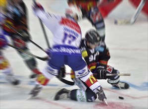 Two ice hockey clashing in game