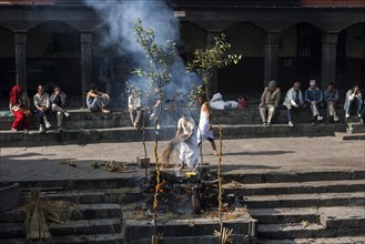 Cremation in front of the Pashupatinath Temple on the river Bagmati
