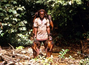 Poacher returning from the hunt with hunted prey