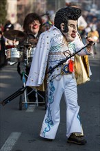 Drum major dressed up as Elvis at the carnival procession of the Mattli guild