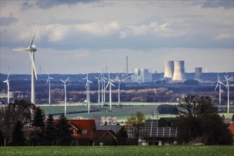 Solar roofs and wind turbines in front of coal-fired power plant RWE power plant Westfalen