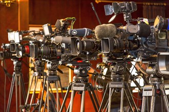 Television cameras on tripods
