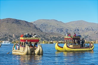 Boats off the floating islands of the Uros on Lake Titicaca
