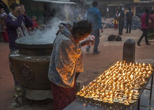 Buddhists in prayer at dawn