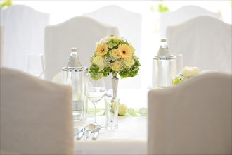 Bridal bouquet on wedding table