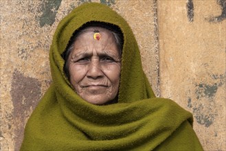 Nepalese woman with green cape