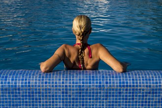 Woman at a swimming pool