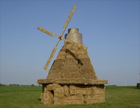 Windmill made of straw bales