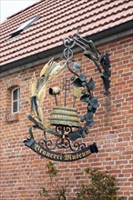Handcrafted hanging sign of the Brewery Museum