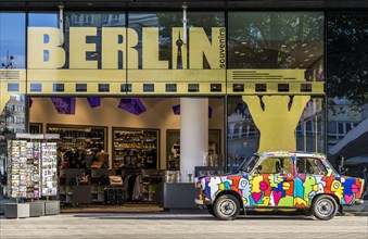 Souvenir shop with colourful Trabant car at Alexanderplatz square