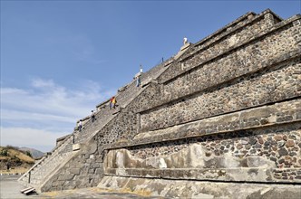 Tourists climbing the Pyramid of the Moon