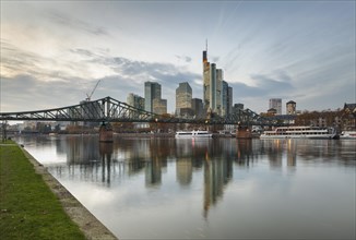 River Main with the modern skyline of the Financial District and the Iron Bridge