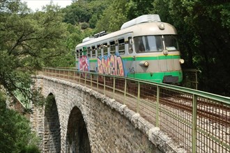 The Trenino Verde narrow-gauge railway en route from Arbatax to Mandas on a bridge near Niala