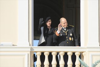 Princess Charlene and Prince Albert II. of Monaco at the Prince's Palace on Fete du Prince national holiday