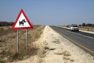 Road sign warning of warthogs