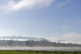 Fog above the fields in autumn