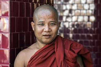 Monk at the Mahamuni Buddha Temple or Mahamuni Pagoda