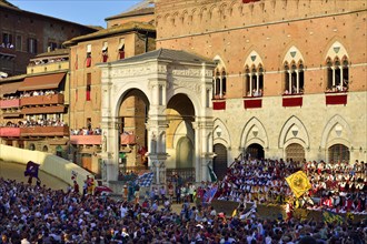 Crowds in front of the Palazzo Pubblico at the historical horse race Palio di Siena